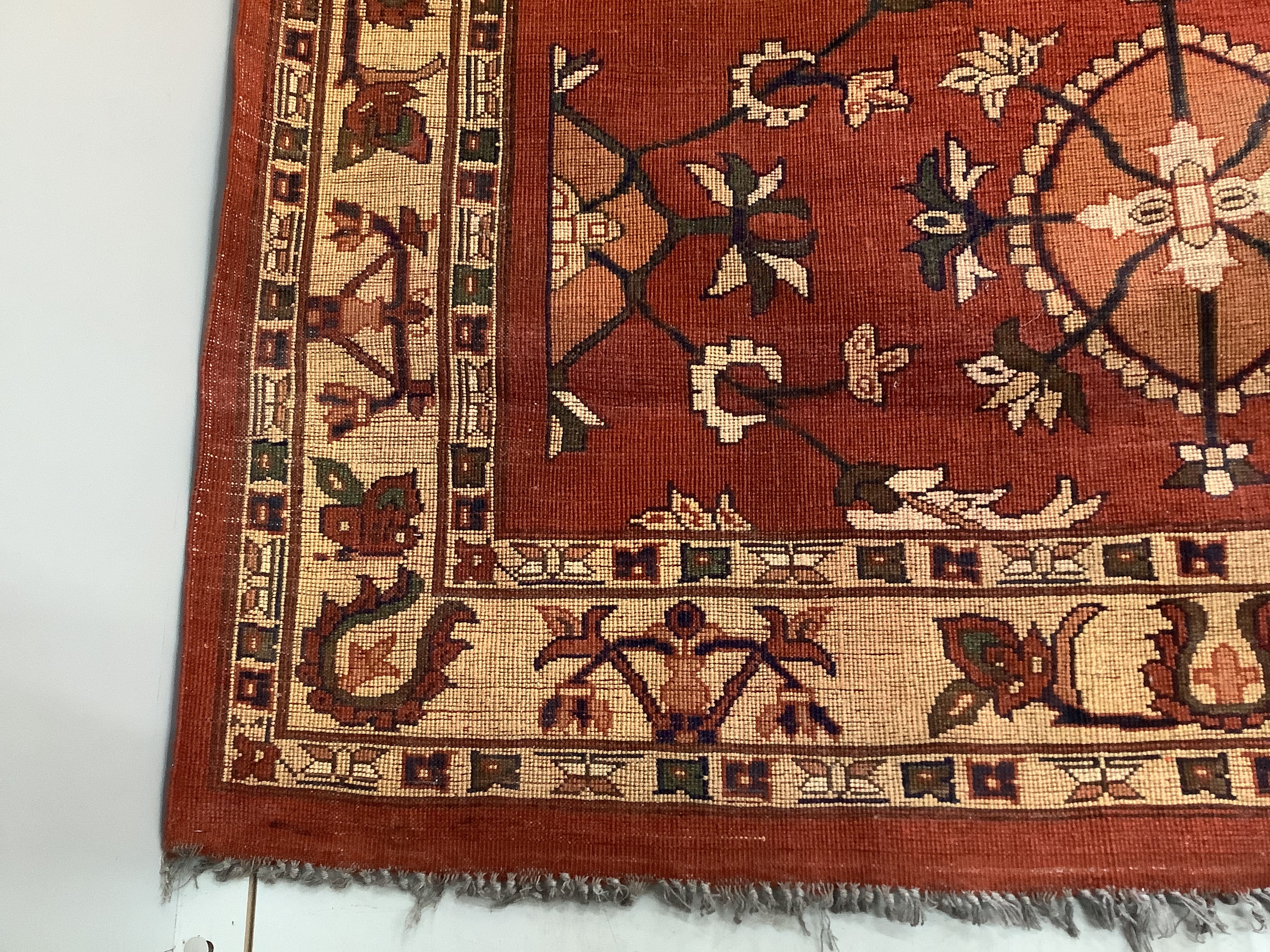 Two Turkish red ground rugs, larger 156 x 130cm